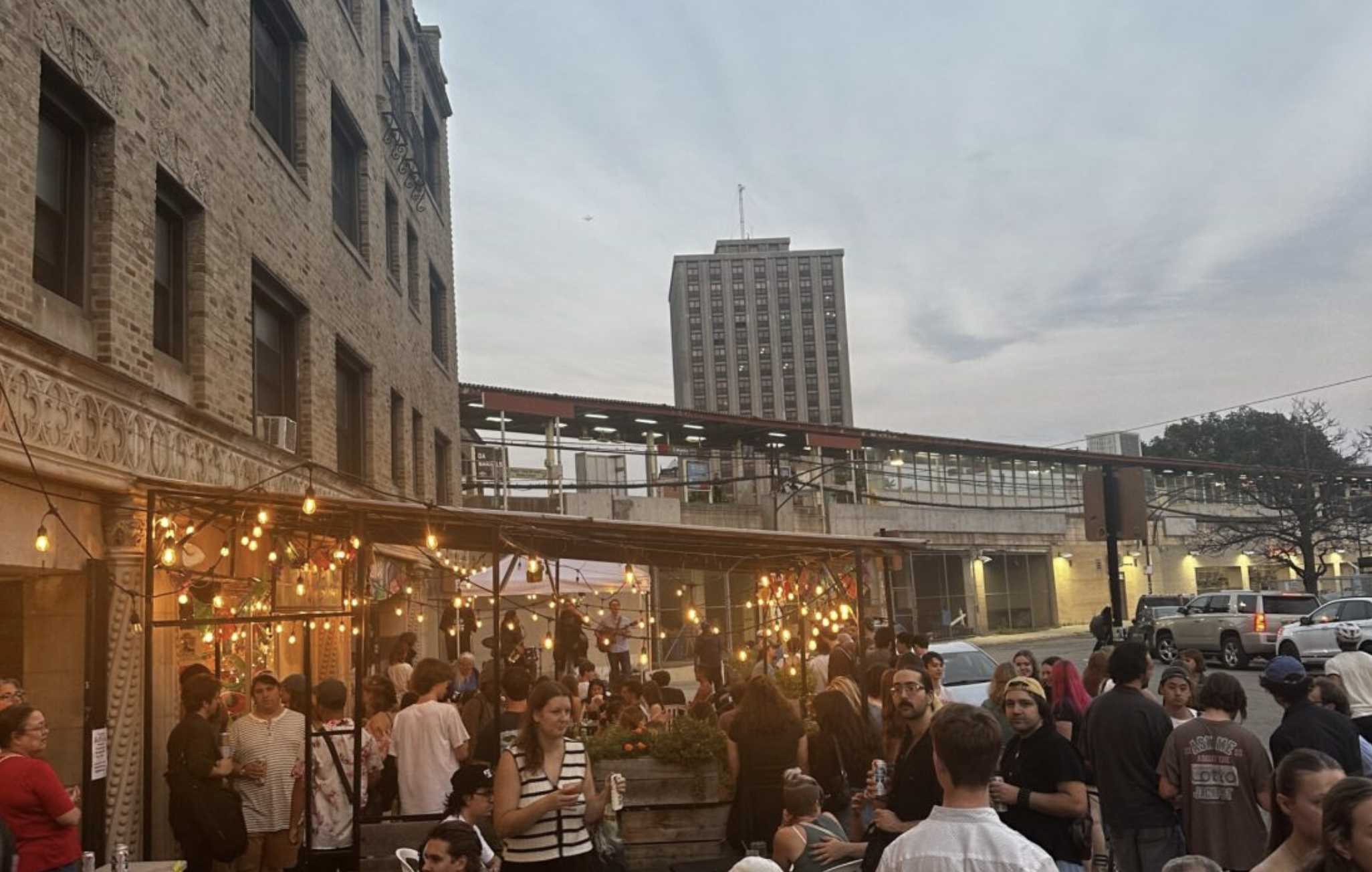 Community gathering outside the building